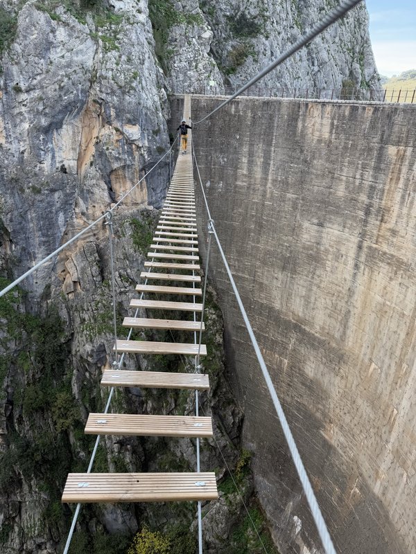 Across the rope bridge beside the dam